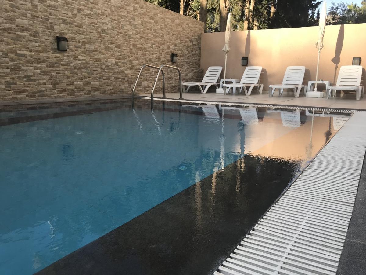 עמאן Almond Hotel Apartments מראה חיצוני תמונה